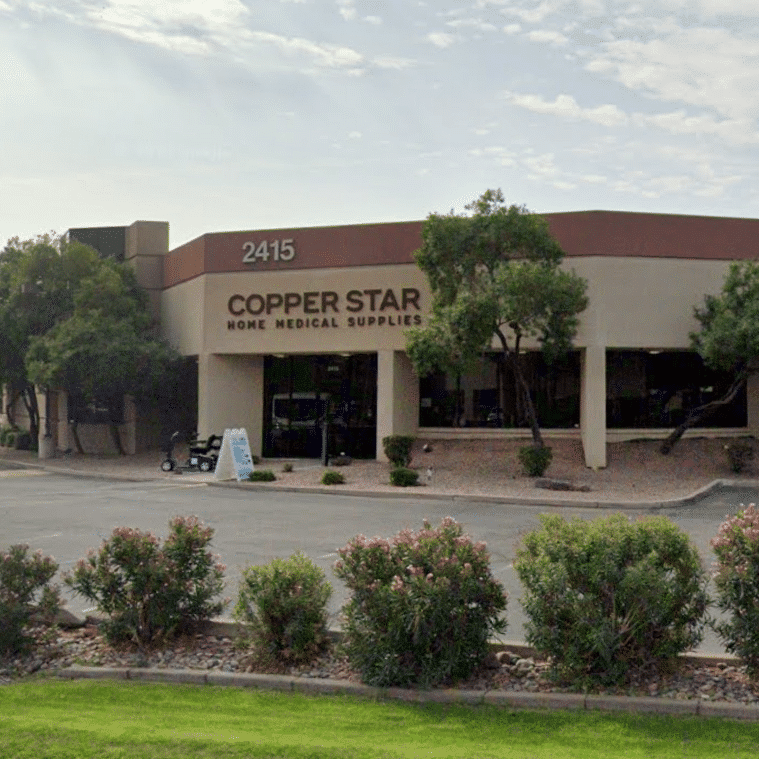 Copper Star Home Medical Supplies Tempe Storefront surrounded by trees and bushes